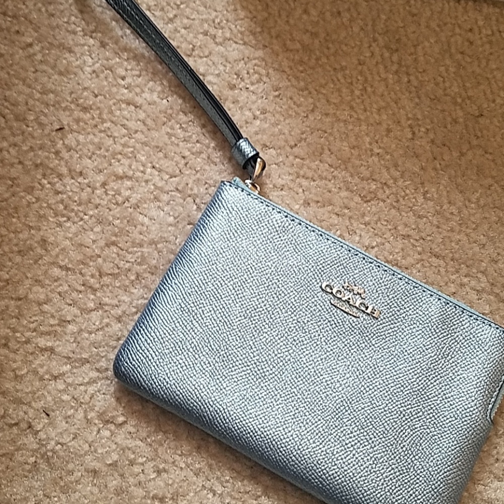 BNWT Coach metallic blue wristlet